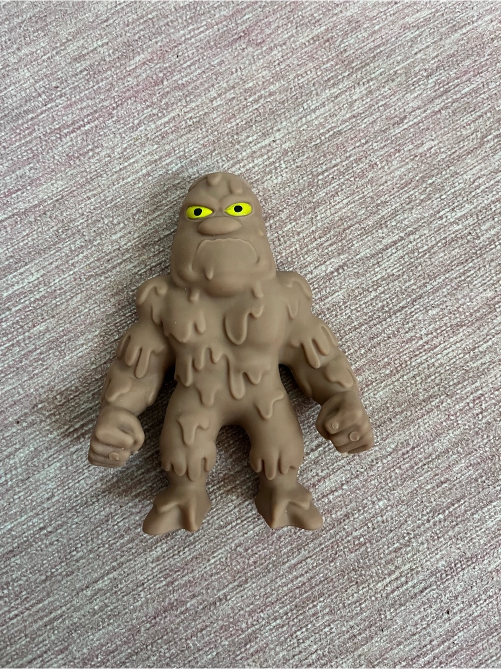 Sand-filled stretchy monster squishy toy